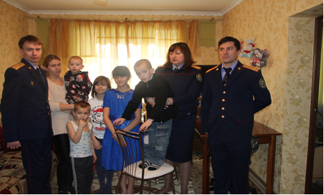 Yulia and family in new house by charity Generaion (Google ())